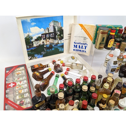 49 - A large quantity of miniatures. Mostly unopened. Including Bell's Scotch Whisky, Southern Comfort, I... 