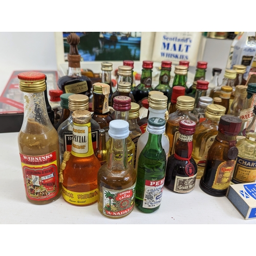 49 - A large quantity of miniatures. Mostly unopened. Including Bell's Scotch Whisky, Southern Comfort, I... 