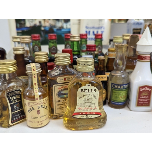 49 - A large quantity of miniatures. Mostly unopened. Including Bell's Scotch Whisky, Southern Comfort, I... 