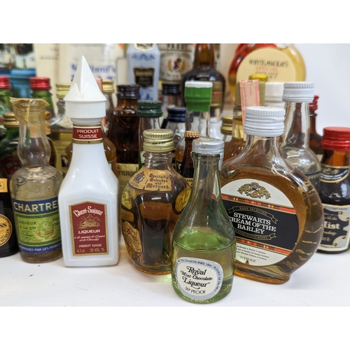 49 - A large quantity of miniatures. Mostly unopened. Including Bell's Scotch Whisky, Southern Comfort, I... 