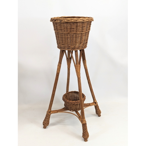 94 - 3 wicker plant stands. Tallest measures 76cm