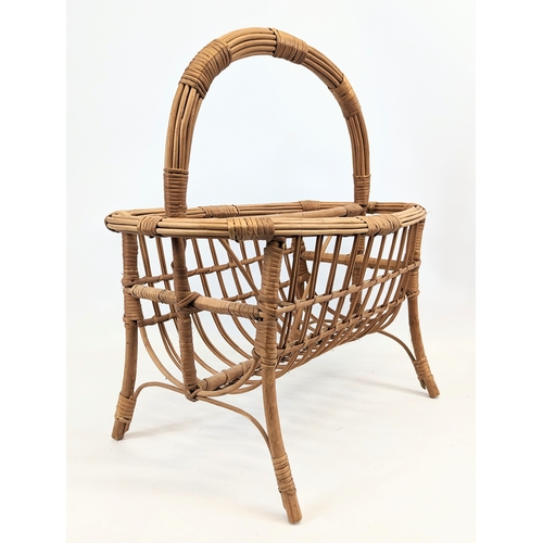 95 - A wicker basket and wicker magazine rack. Magazine rack measures 50x55cm