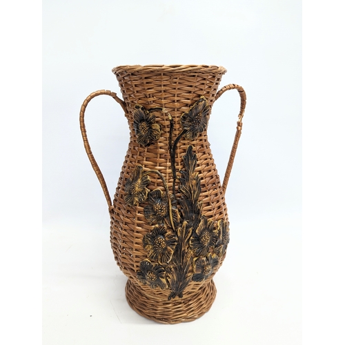 96 - 4 pieces of wicker, including 3 vases and a stick stand. Stick stand measures 42.5cm