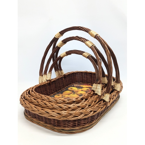 97 - A set of 3 wicker baskets. Larges measures 55x47cm