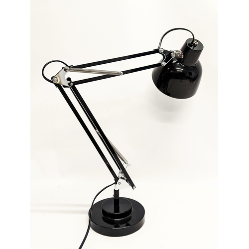 105 - A large angle poise lamp. 52cm