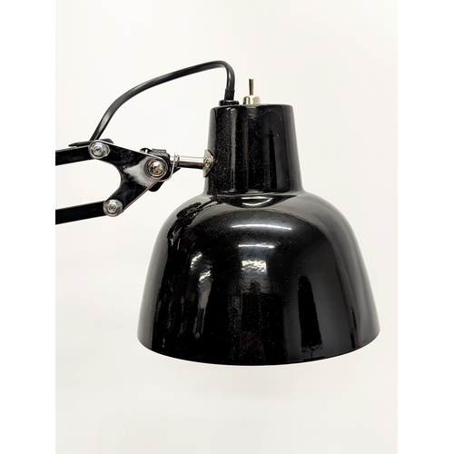 105 - A large angle poise lamp. 52cm