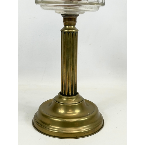 110 - A Victorian oil lamp. 67cm