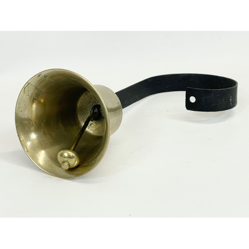 111 - A brass shops bell. 25cm