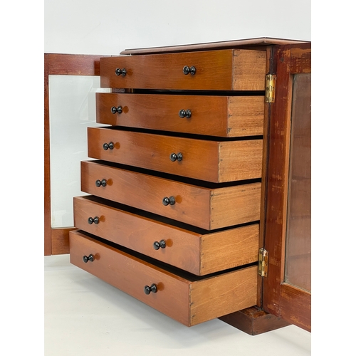 117 - A late Victorian mahogany table top collectors cabinet, with glazed doors. Circa 1900. 38.5 x 25 x 4... 