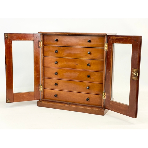 117 - A late Victorian mahogany table top collectors cabinet, with glazed doors. Circa 1900. 38.5 x 25 x 4... 