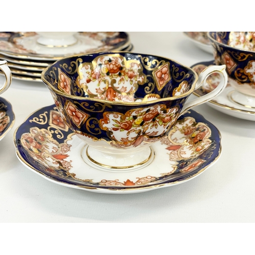 490 - A 19 piece Royal Albert “Heirloom” pattern tea set. 6 sandwich plates, 7 cups, 6 saucers