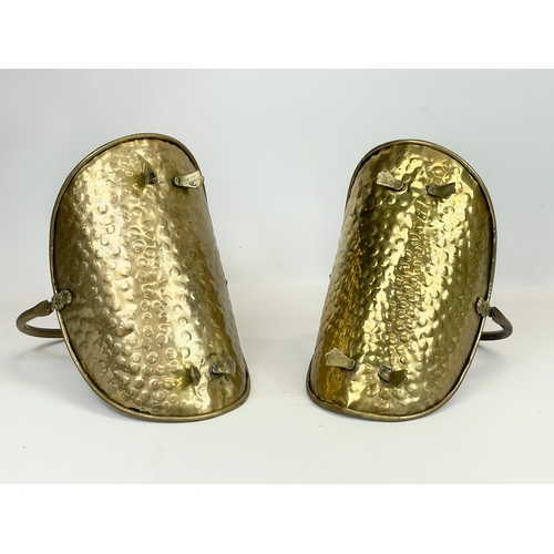 118 - A pair of small vintage brass log holders. 26.5 x 19 x 25cm including handle.