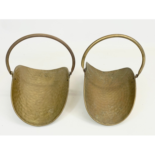 118 - A pair of small vintage brass log holders. 26.5 x 19 x 25cm including handle.