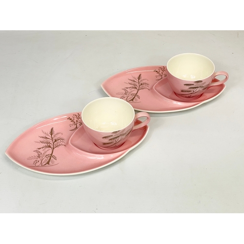 496 - A pair of 1930’s Royal Winton “Georgia” pattern cups and saucers. 24cm