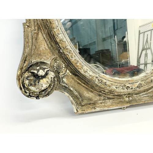 15 - A large Victorian gilt framed mirror. 83 x 111cm