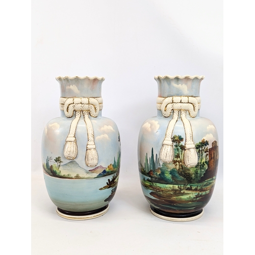 498 - A pair of vintage vases. 31cm