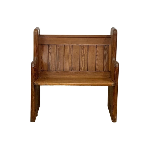 926 - A late Victorian pitch pine pew, with brass handles. Circa 1890. 92 x 51 x 93cm