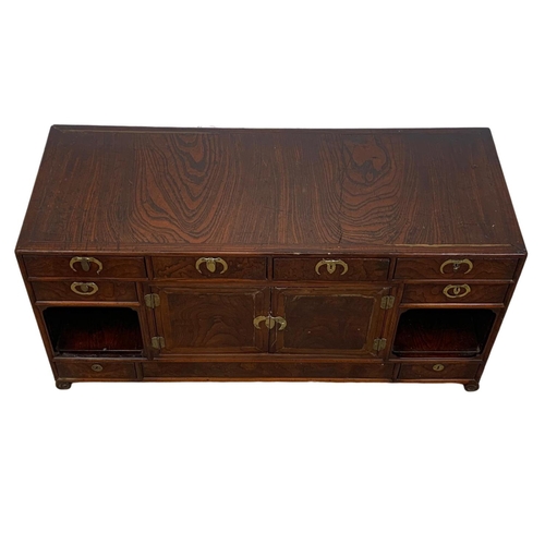 933 - A mid 19th century Korean elm table top cabinet with 8 drawers and 2 door cupboard. 97 x 38 x 48cm