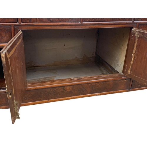 933 - A mid 19th century Korean elm table top cabinet with 8 drawers and 2 door cupboard. 97 x 38 x 48cm