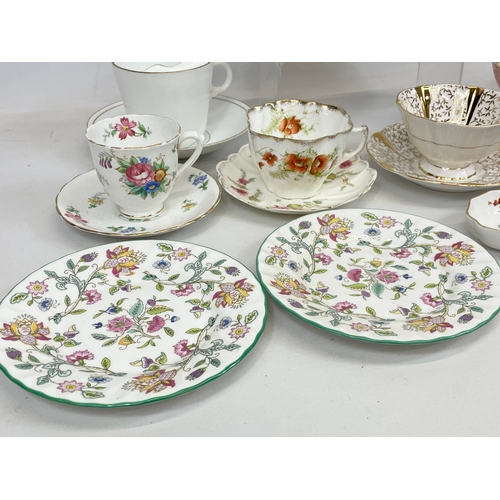 509 - A quantity of porcelain cups and saucers. Royal Albert, Royal Crown Derby, Tuscan, Minton, Cauldon, ... 