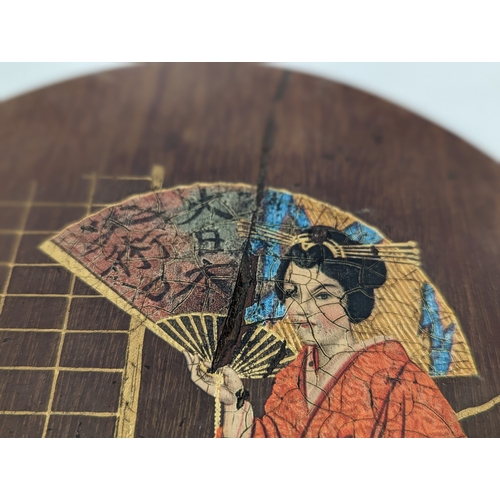 168 - A pair of early 20th century Japanese hand painted wall plaques. 25x35cm