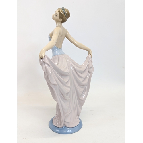 654 - A large Lladro pottery figurine, 