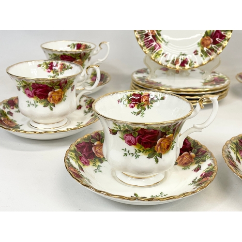 514 - An 18 piece Royal Albert Old Country Roses tea set. 6 sandwich plates, 6 cups and 6 saucers.