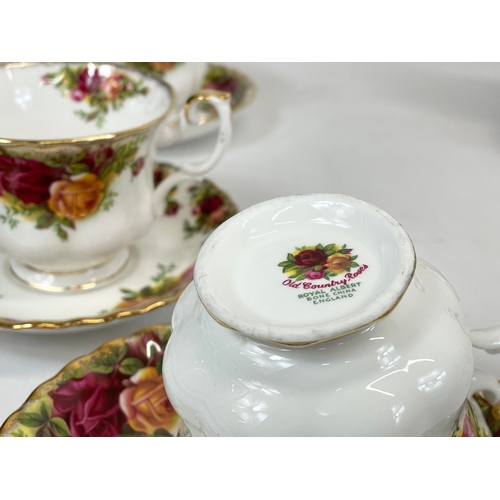 514 - An 18 piece Royal Albert Old Country Roses tea set. 6 sandwich plates, 6 cups and 6 saucers.