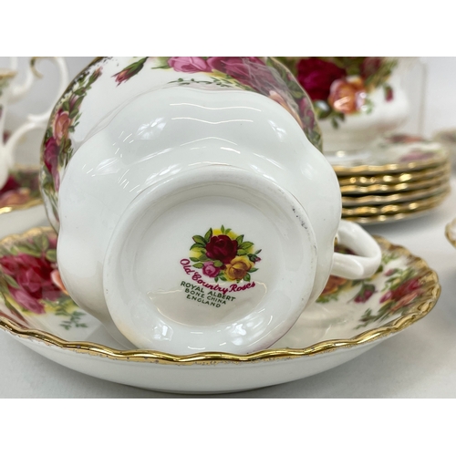 519 - A 21 piece Royal Albert Old Country Roses tea set.