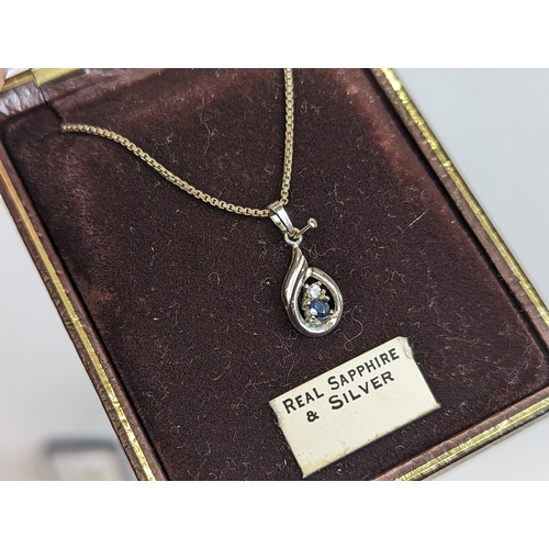 613 - A sapphire and silver necklace