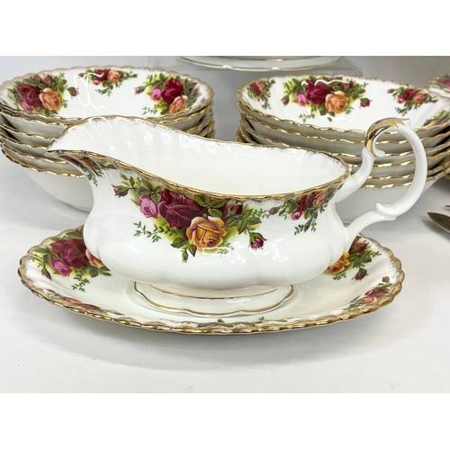 663 - A quantity of Royal Albert Old Country Roses dinnerware. 12 salad plates 20.5cm, a tureen 29cm, 12 s... 