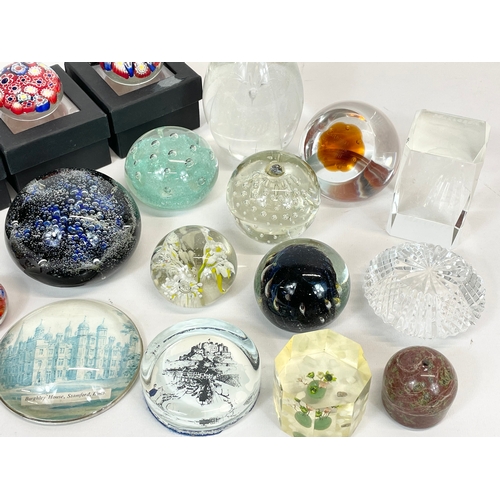 666 - A collection of Paperweights.