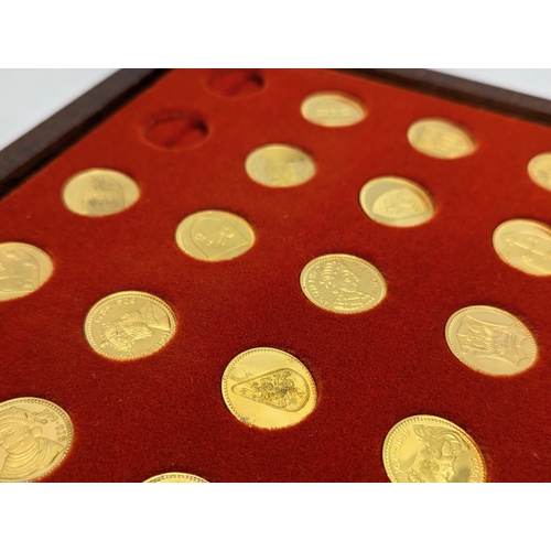 601 - A collection of 10ct gold plated Our Royal Sovereigns.