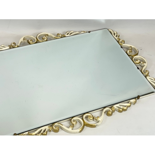 182 - A vintage gilt framed bevelled mirror. 72.5 x 49.5cm