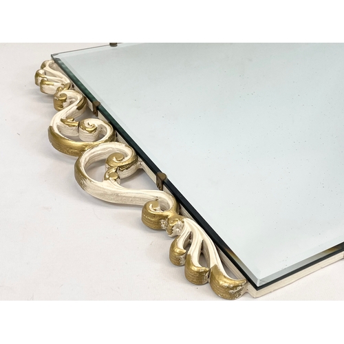 182 - A vintage gilt framed bevelled mirror. 72.5 x 49.5cm