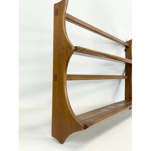 186 - An Ercol Golden Dawn Mid Century elm plate rack. 96.5cm