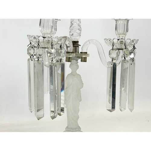 646 - A large Victorian glass candelabra with frosted glass figure on mirrored base. 29 x 45cm