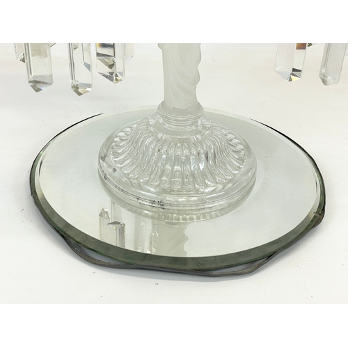 646 - A large Victorian glass candelabra with frosted glass figure on mirrored base. 29 x 45cm