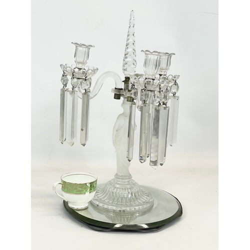 646 - A large Victorian glass candelabra with frosted glass figure on mirrored base. 29 x 45cm