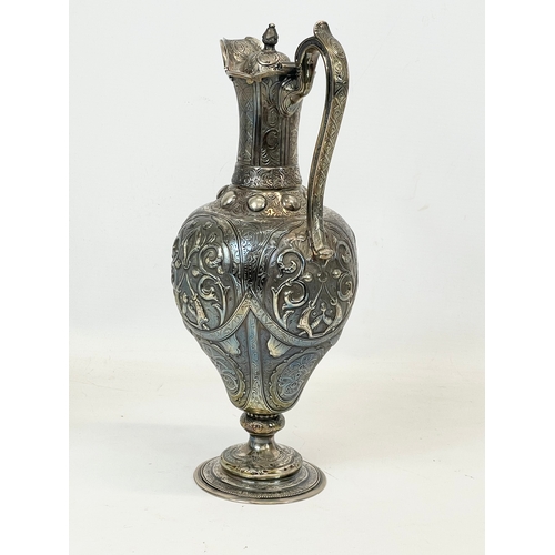 645 - A 19th century silver plated claret jug, presented by The Officers and Clerical Departments of the A... 