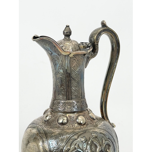 645 - A 19th century silver plated claret jug, presented by The Officers and Clerical Departments of the A... 