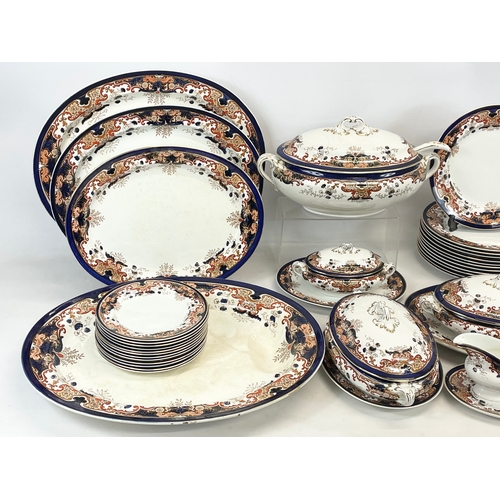 688 - A 63 piece late Victorian Booths Silicon China “Lucania” pattern dinner set. Circa 1895. Large turke... 