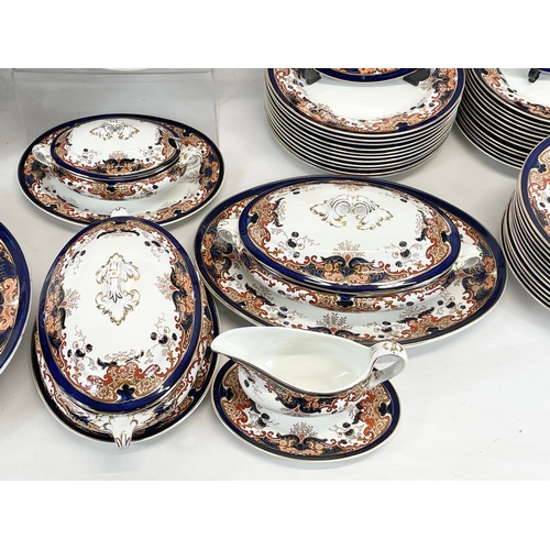 688 - A 63 piece late Victorian Booths Silicon China “Lucania” pattern dinner set. Circa 1895. Large turke... 