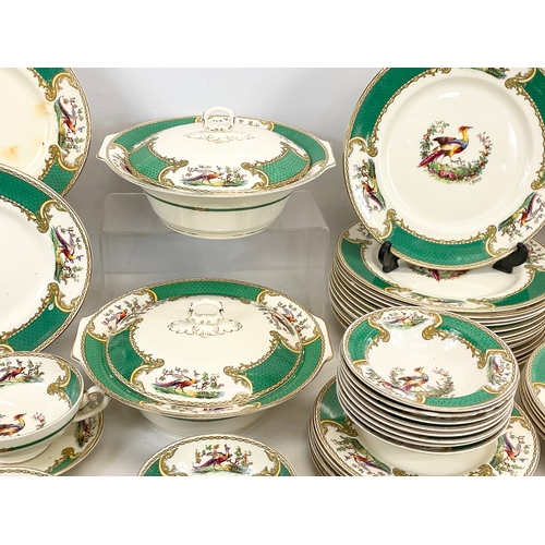 689 - A 123 piece Royal Myotts “Chelsea Bird” green pattern  dinner set. Circa 1930’s. 3 platters, largest... 