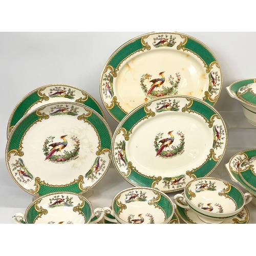 689 - A 123 piece Royal Myotts “Chelsea Bird” green pattern  dinner set. Circa 1930’s. 3 platters, largest... 