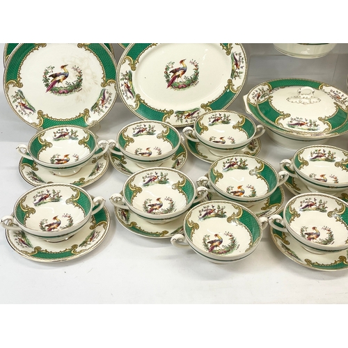 689 - A 123 piece Royal Myotts “Chelsea Bird” green pattern  dinner set. Circa 1930’s. 3 platters, largest... 