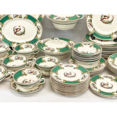 689 - A 123 piece Royal Myotts “Chelsea Bird” green pattern  dinner set. Circa 1930’s. 3 platters, largest... 