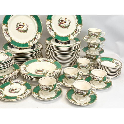 689 - A 123 piece Royal Myotts “Chelsea Bird” green pattern  dinner set. Circa 1930’s. 3 platters, largest... 