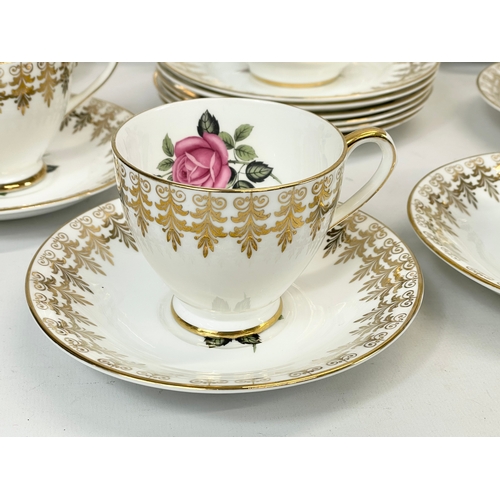 691 - A 21 piece Elizabethan tea set. By Taylor & Kent.