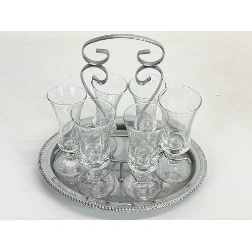 694 - 2 crystal drinks sets on silver plated trays. Largest 23 x 23cm